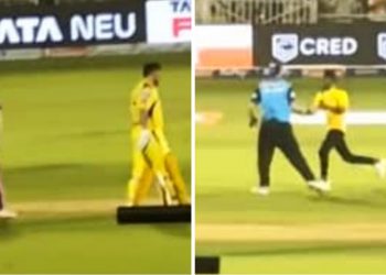 A fan attempted to meet MS Dhoni as he dodged the security in the stadium and entered the field to meet his idol. Umpire becomes obstacle